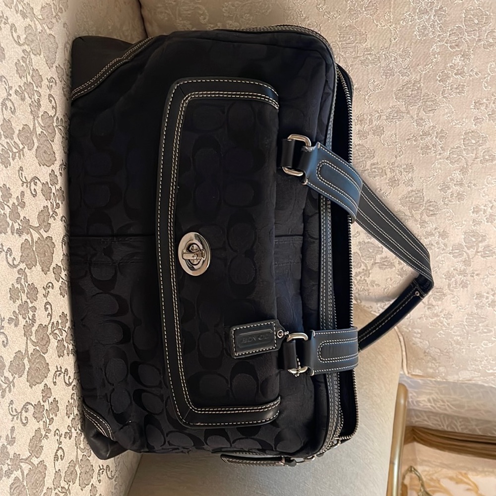 Coach bag great for traveling or can be used for many things